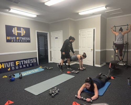 Adult over 40 lifting at Hive Fitness in Woodstock